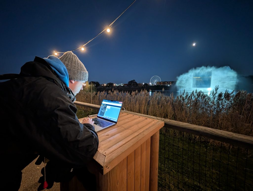 James lining up projectors on the fountain